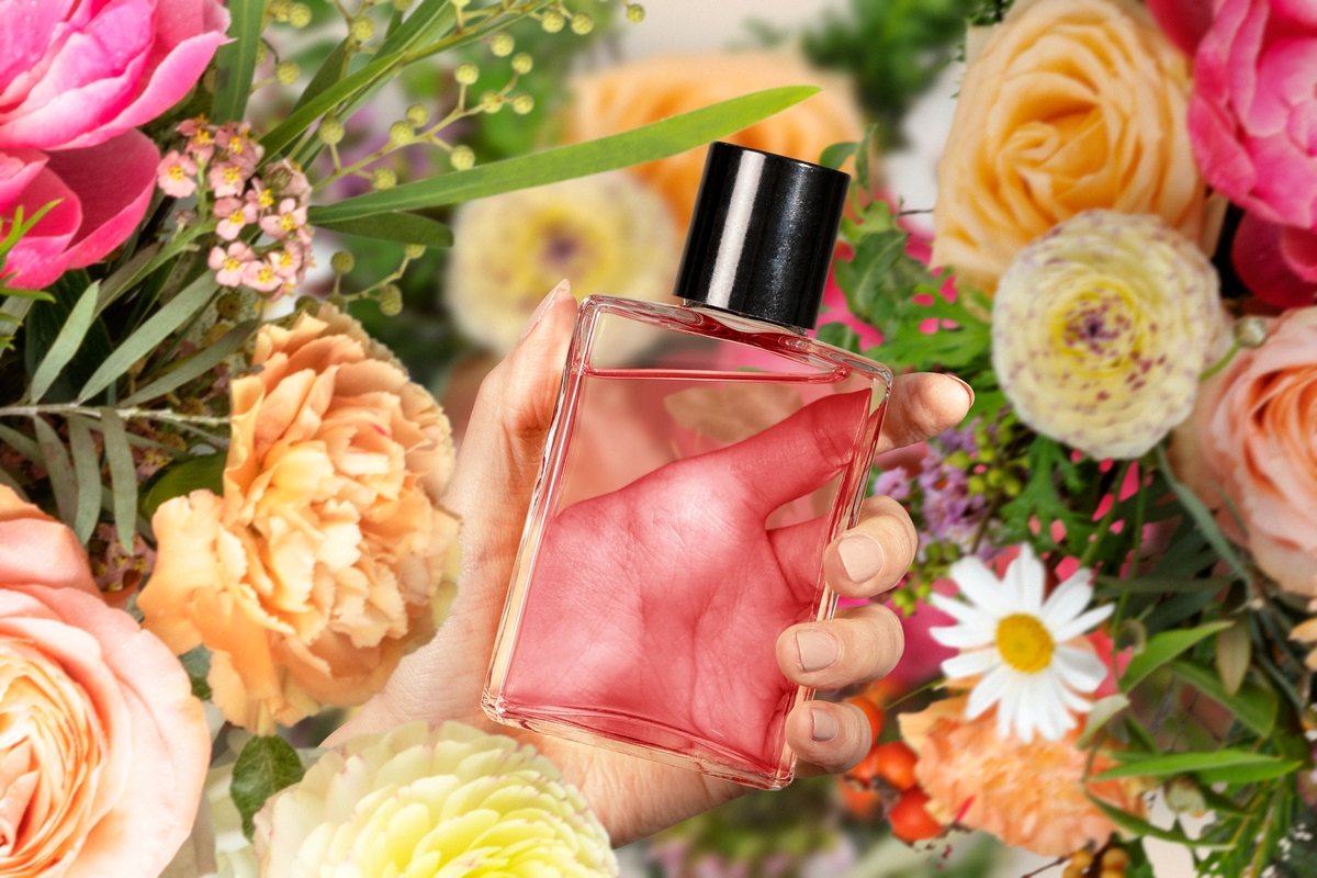 ink Perfume Bottle with Floral Background - Fragralush Elegance